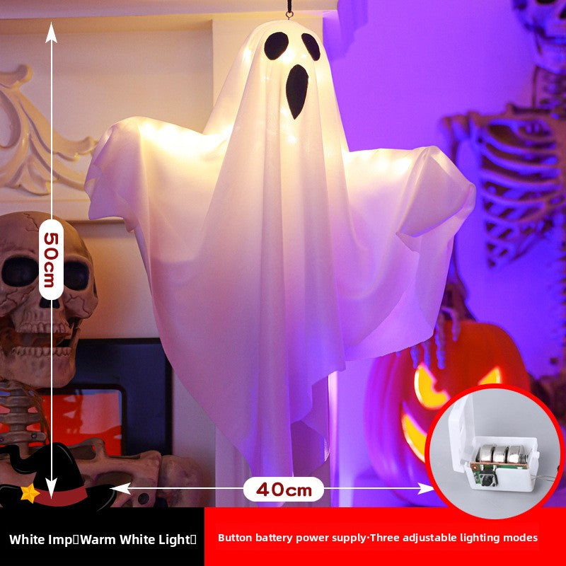 Orange fabric ghost hanging light at 50 by 40 cm with warm white glow and button battery power box