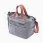 Insulated lunch bag worn across the body on the detachable adjustable shoulder strap
