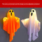 Orange and white fabric ghost hanging lamps glowing warm white with arms bent into a floating pose