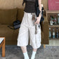 Full styled look of khaki wide leg cargo pants with fitted top and loafers