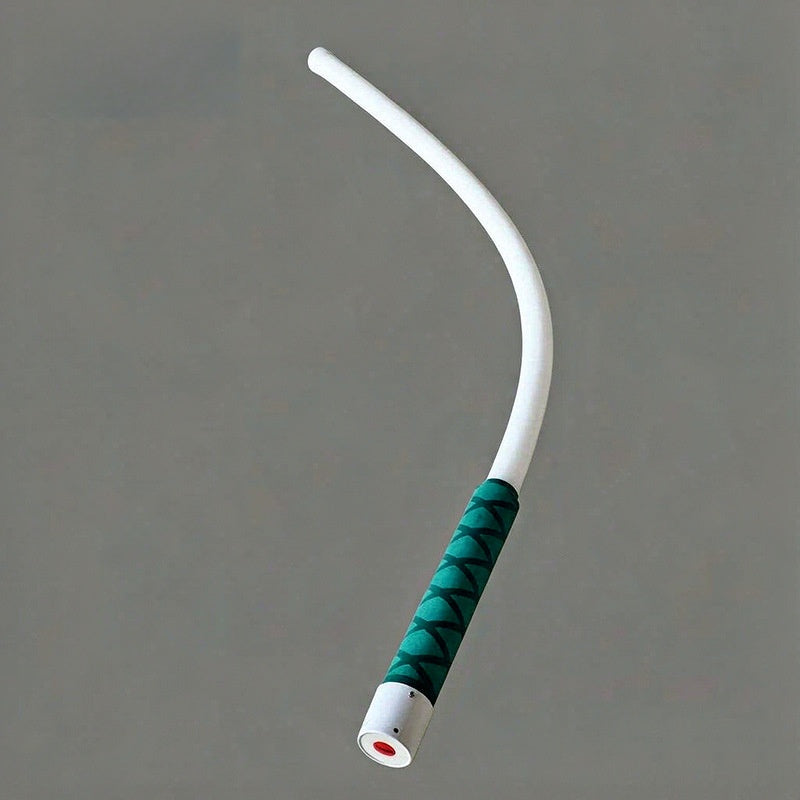 Flexible LED work light propped in a tight space lighting a work area