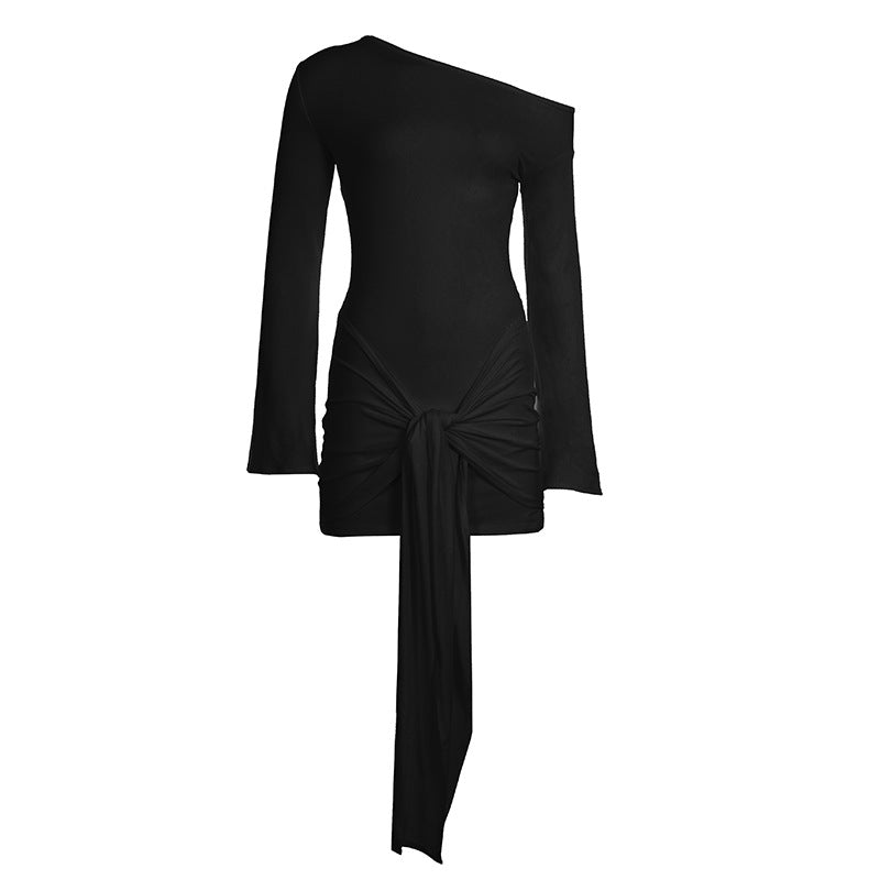Black slanted shoulder mini dress with bell sleeves and a hanging knot tail, white background product view