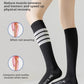 Legs in black striped compression calf socks showing snug hold around the calf muscle