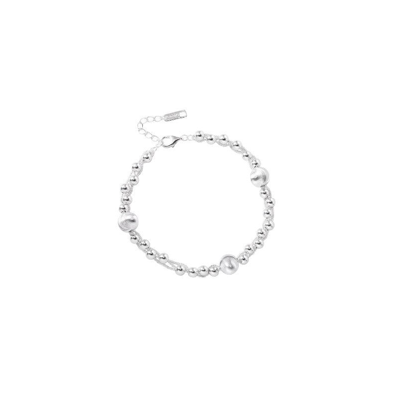 Silver brushed bead bracelet on white, lobster clasp and extender chain with S925 tag