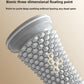 Foot massage roller rolled under the arch of a bare foot on the floor