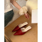 Backless mule showing the insole and open heel