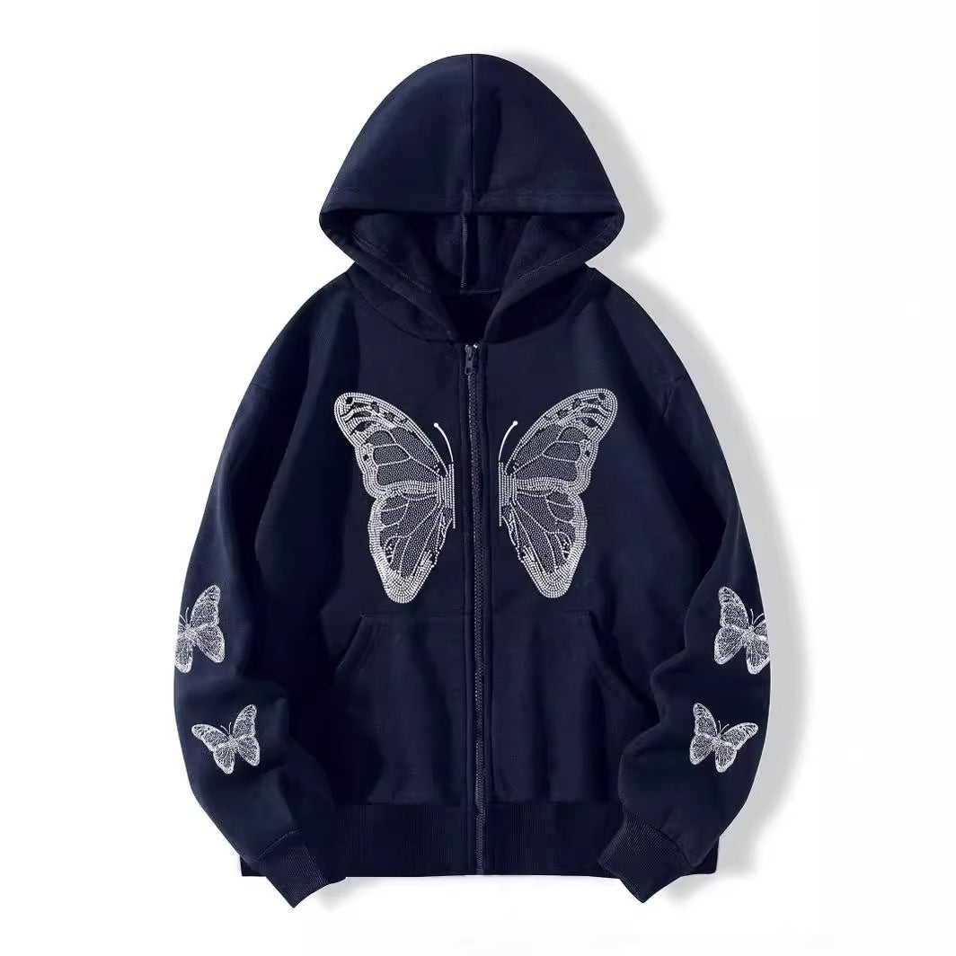 Close up of the soft fleece and the rhinestone butterfly motif on the hoodie