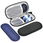 Black insulated case open with foil lining, mesh pocket and pens, with a navy ice pack beside it