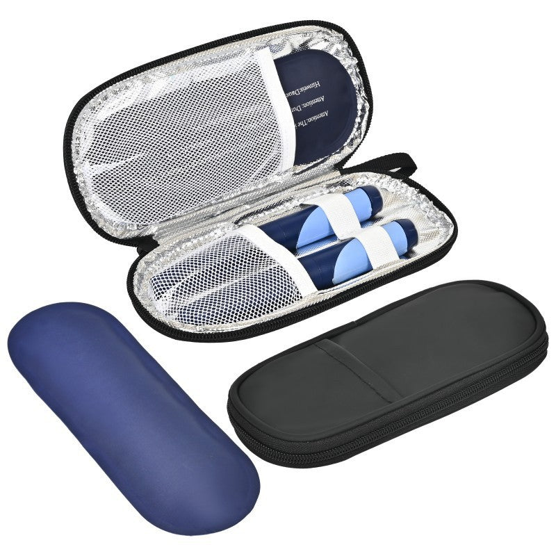 Black insulated case open with foil lining, mesh pocket and pens, with a navy ice pack beside it