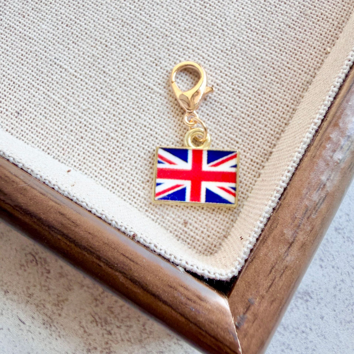 UK enamel country flag keychain charm on a gold tone lobster clasp for keys and bags