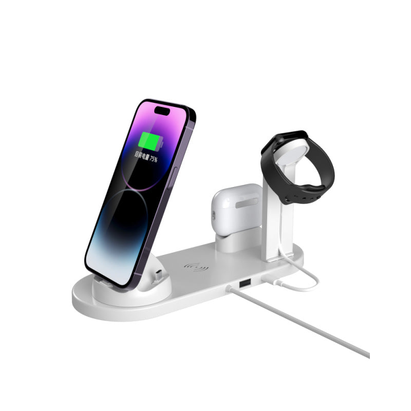 White four in one charging stand with phone, watch and earbuds and a USB cable at the base