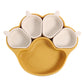 Earthy yellow bear paw plate with four small cream cups on a white background