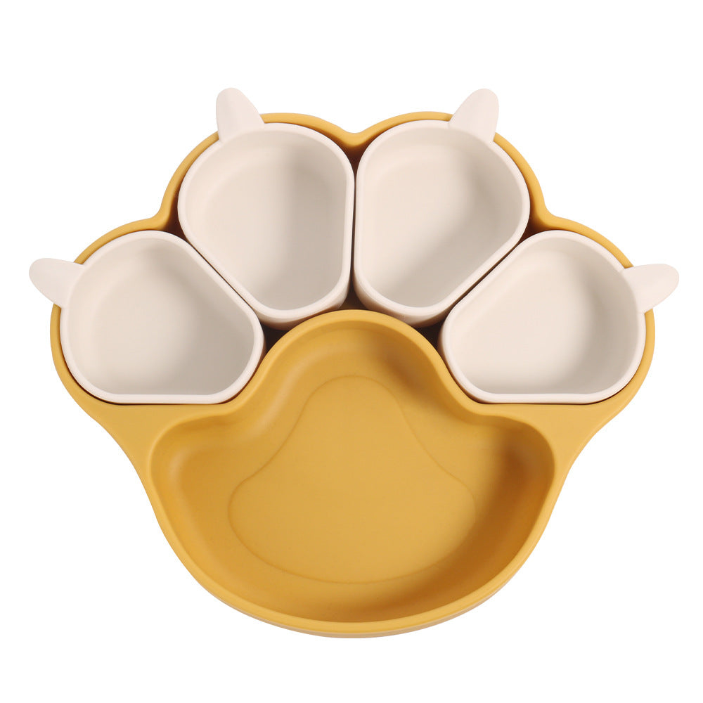 Earthy yellow bear paw plate with four small cream cups on a white background