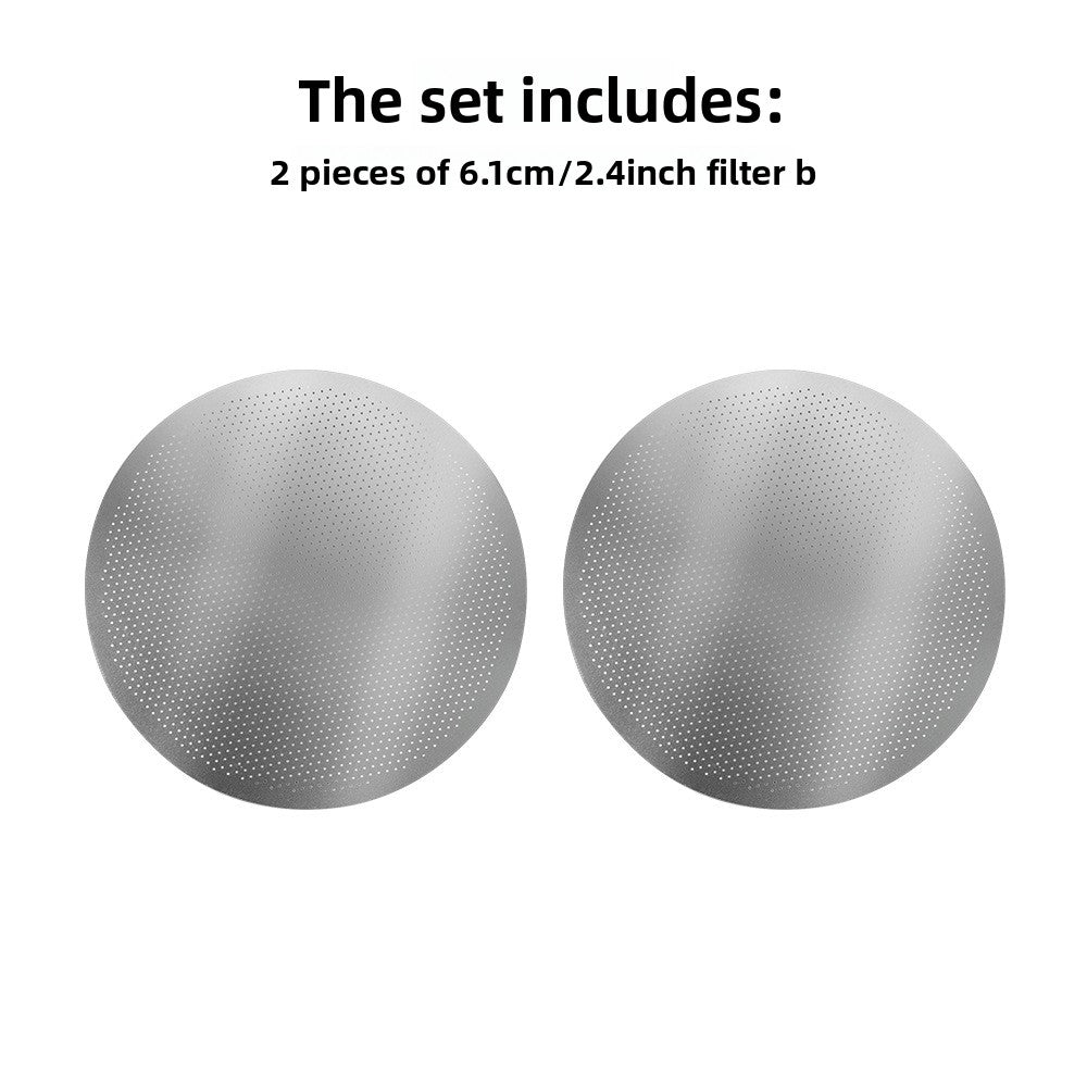 Two perforated stainless steel coffee filter discs with fine etched holes, 6.1 cm across
