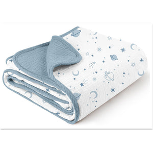 Muslin baby blanket draped to show layered gauze weave from the side