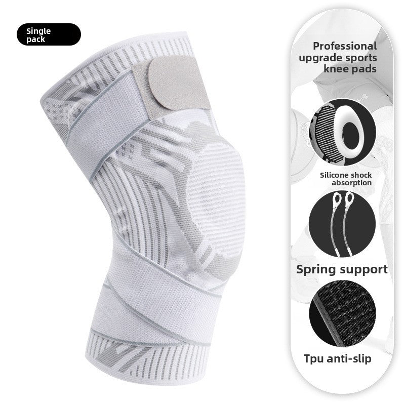 Sports knee brace with reinforced padded kneecap panel and adjustable support strap