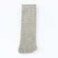 Light gray five-toe cotton sock laid flat with separated knit toe sleeves