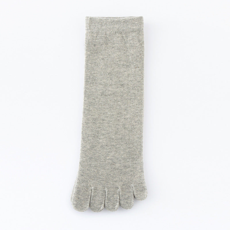 Light gray five-toe cotton sock laid flat with separated knit toe sleeves