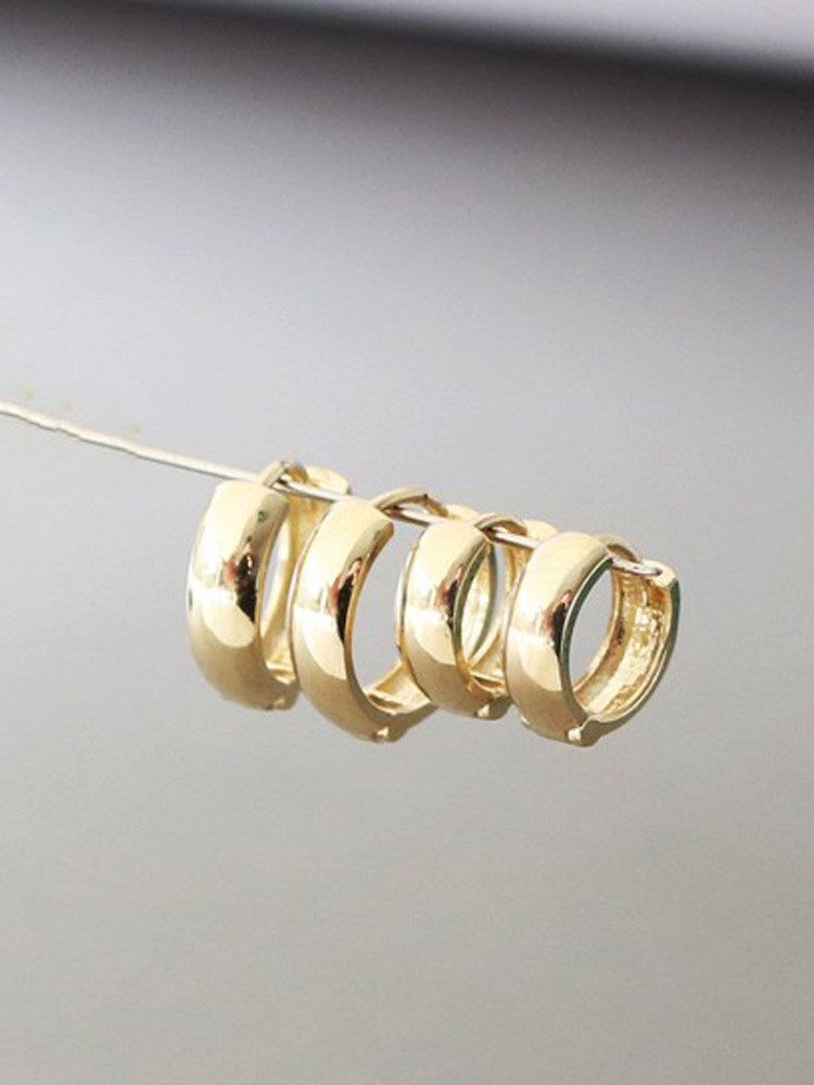 Detail of inner curve of solid 10K gold hoop