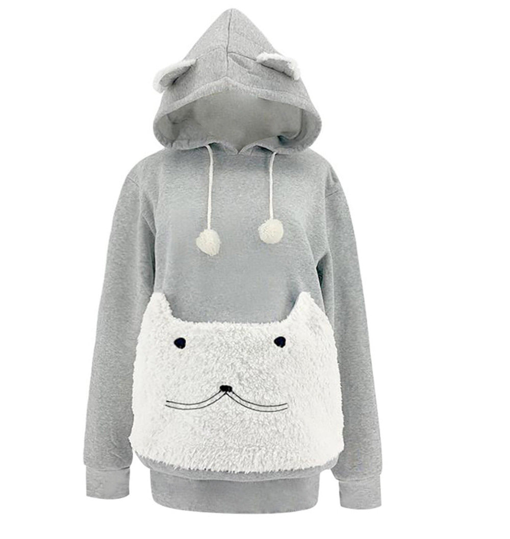 Light gray cat ear hoodie with an empty white plush cat face pouch and white pompom drawstrings