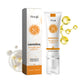 White Hoygi tinted moisturizer tube and printed carton shown with decorative golden serum droplets