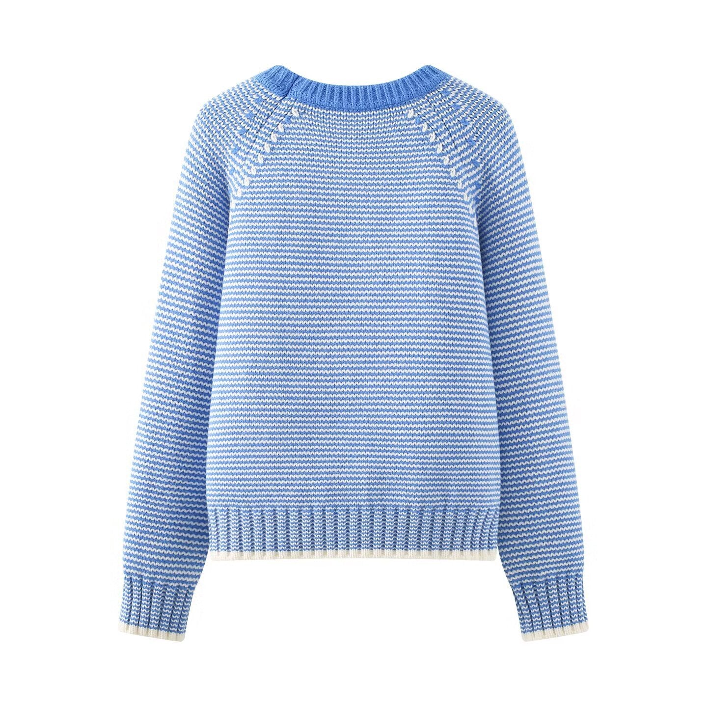Striped knit women's sweater worn with jeans in an everyday weekend look