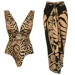 Floral deep V one-piece swimsuit worn on a sunny pool day, plunge neckline
