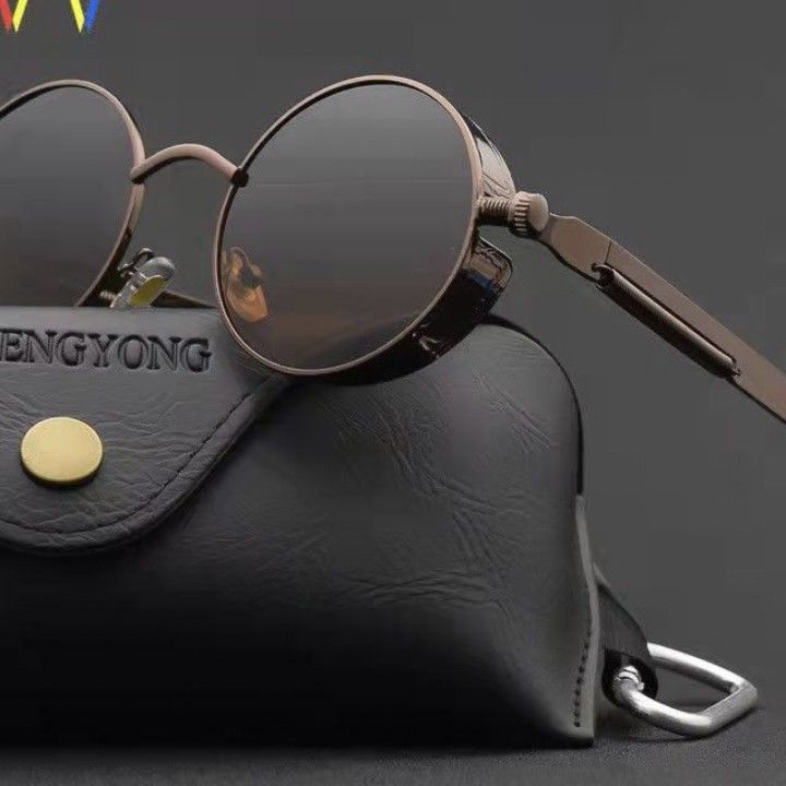 Tinted UV400 round lens sunglasses shown beside a protective case and cleaning cloth