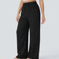 Back view of wide-leg linen yoga pants with relaxed fit