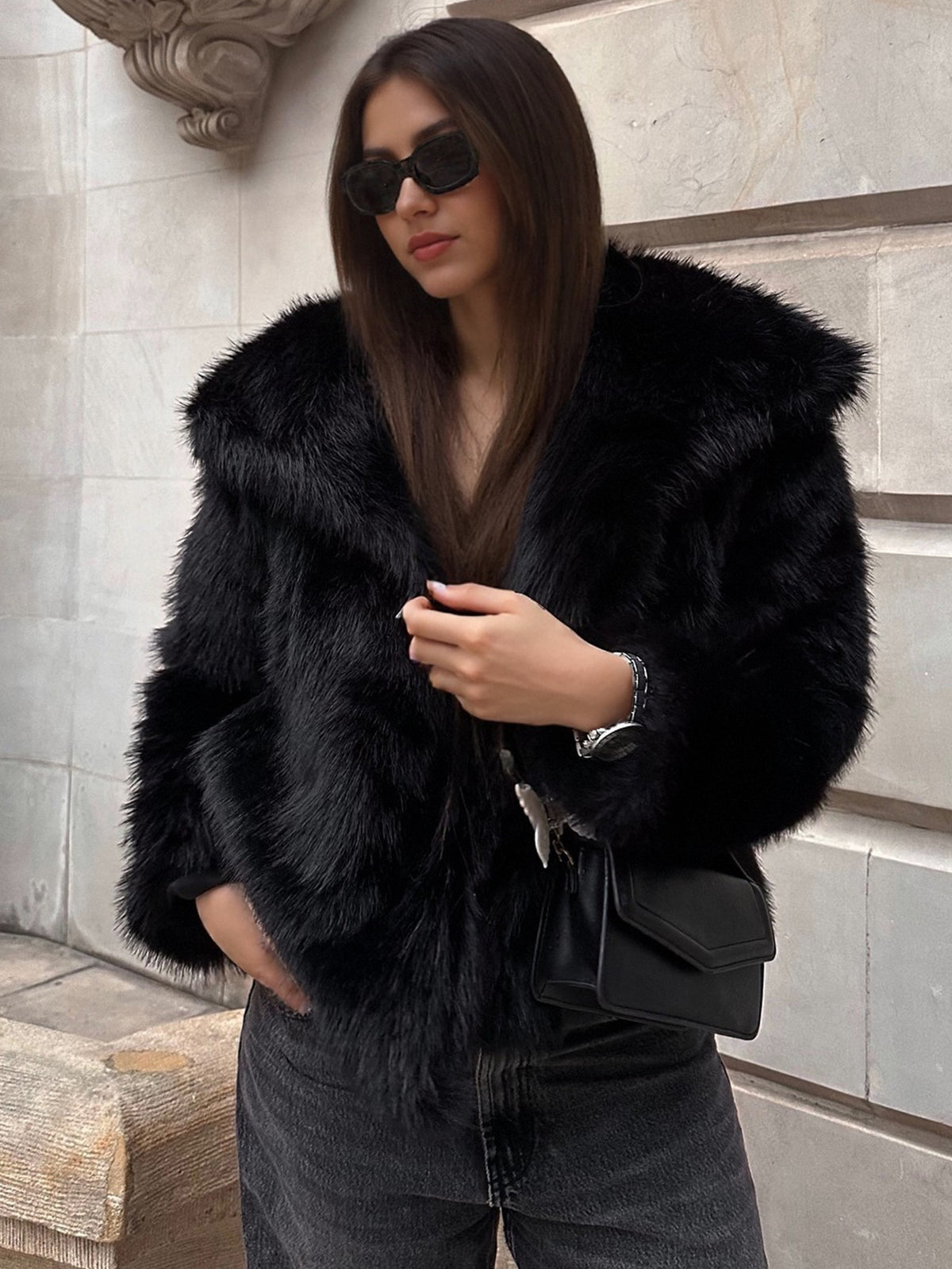 Black vegan fur lapel jacket on a model with gray jeans, option Black, size M