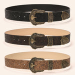 Vintage western floral embossed wide belts shown in black, dark brown and tan with brass buckles