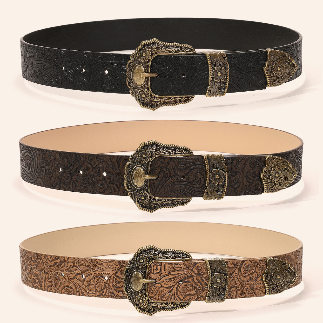Vintage western floral embossed wide belts shown in black, dark brown and tan with brass buckles