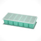 Flexible platinum silicone ice cube tray shown stacked in a freezer for freezing ice cubes