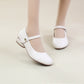 Side buckle strap closure detail on leather shoe