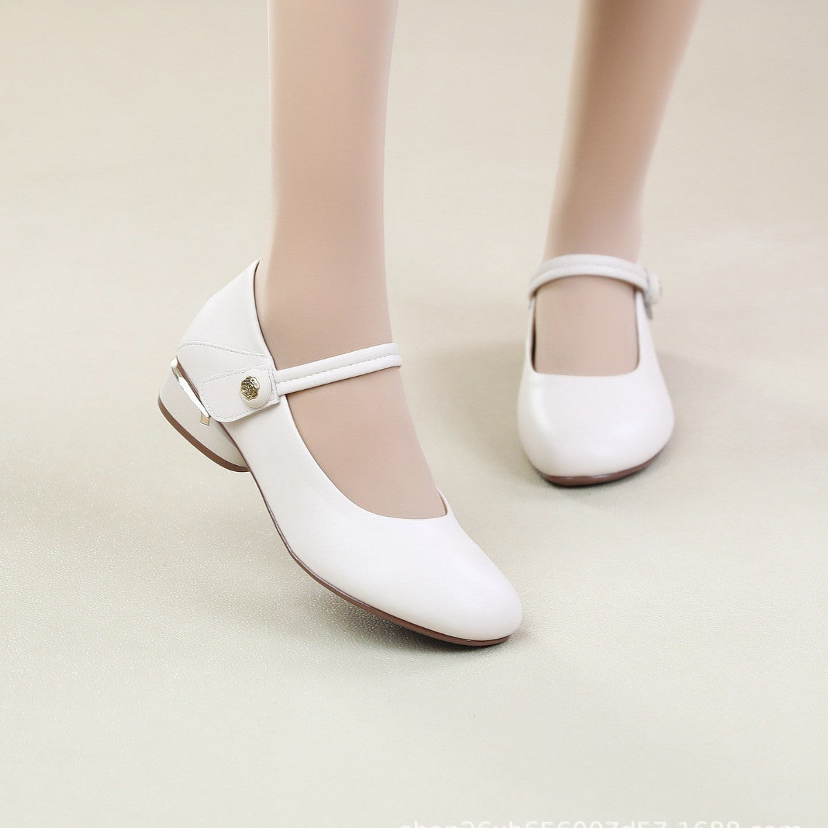 Side buckle strap closure detail on leather shoe