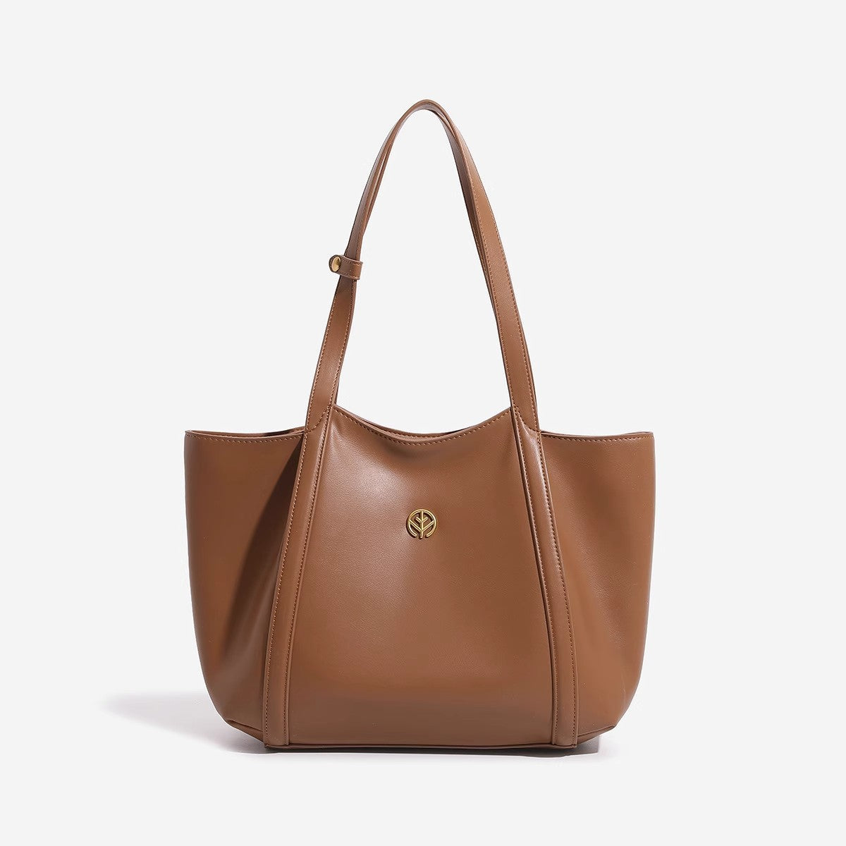 Close up of smooth faux leather surface and stitching on the shoulder tote