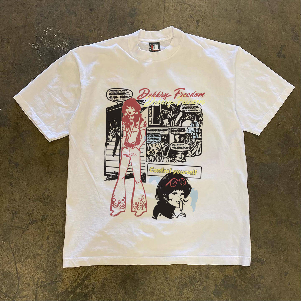 White oversized cotton tee with a retro Y2K comic front print laid flat