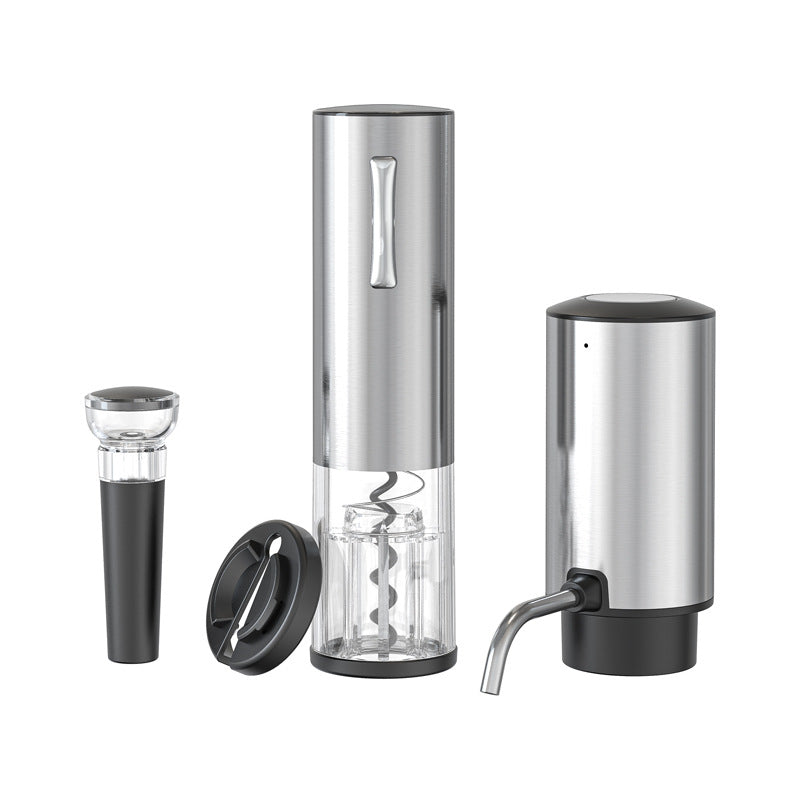 The four piece electric wine set laid out, a vacuum stopper, motorized opener, foil cutter and pourer