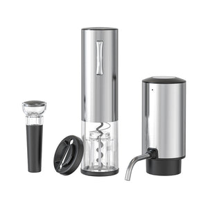 The four piece electric wine set laid out, a vacuum stopper, motorized opener, foil cutter and pourer