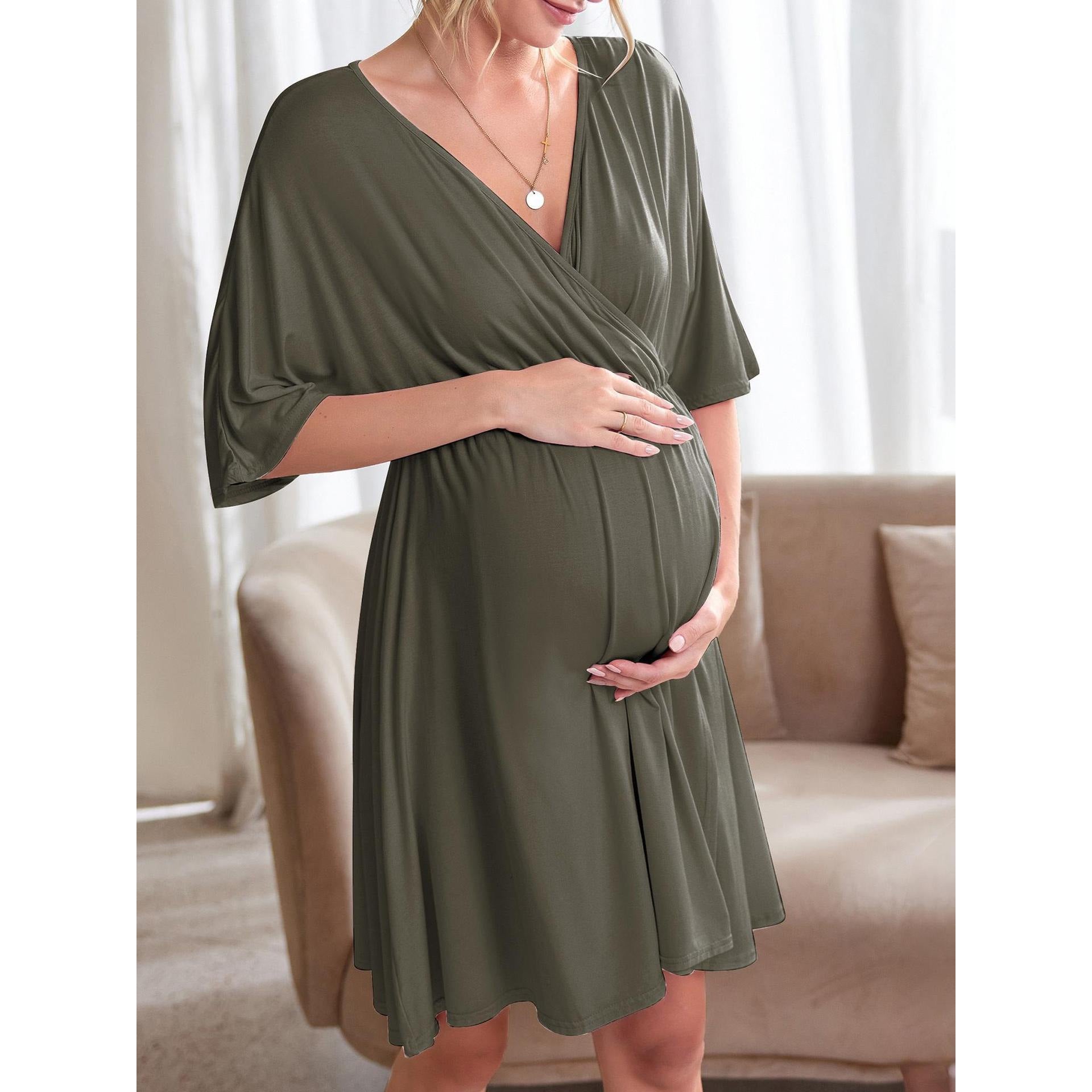 Maternity dress with gathered empire waist falling to a knee length A-line skirt