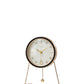 White shell pattern dial desk clock with black bezel and gold hands on a white background with triangular stand