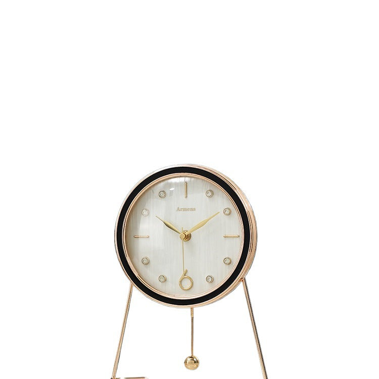 White shell pattern dial desk clock with black bezel and gold hands on a white background with triangular stand
