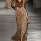 Dark brown maxi dress laid flat to show the full floor-length cut and waist seam