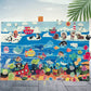 Ocean felt story board lifestyle scene with felt boats, fish and sea creatures on blue water felt