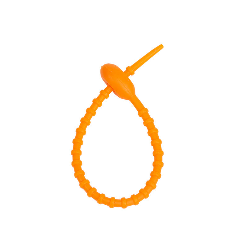 Close view of the ridged silicone strap and the tadpole head that holds the loop
