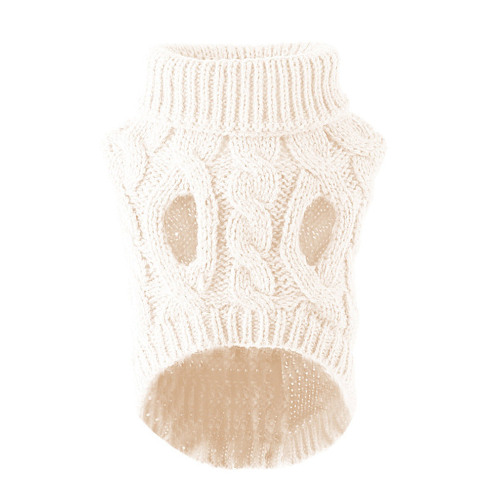 White cable knit dog sweater laid flat showing the ribbed collar, cuffs, and hem