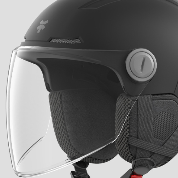 Back view of the half helmet with the rear dial fit adjuster and reflective strip