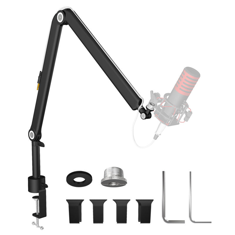 Black aluminum microphone boom arm angled over a desk with a ghost mic outline shown for scale