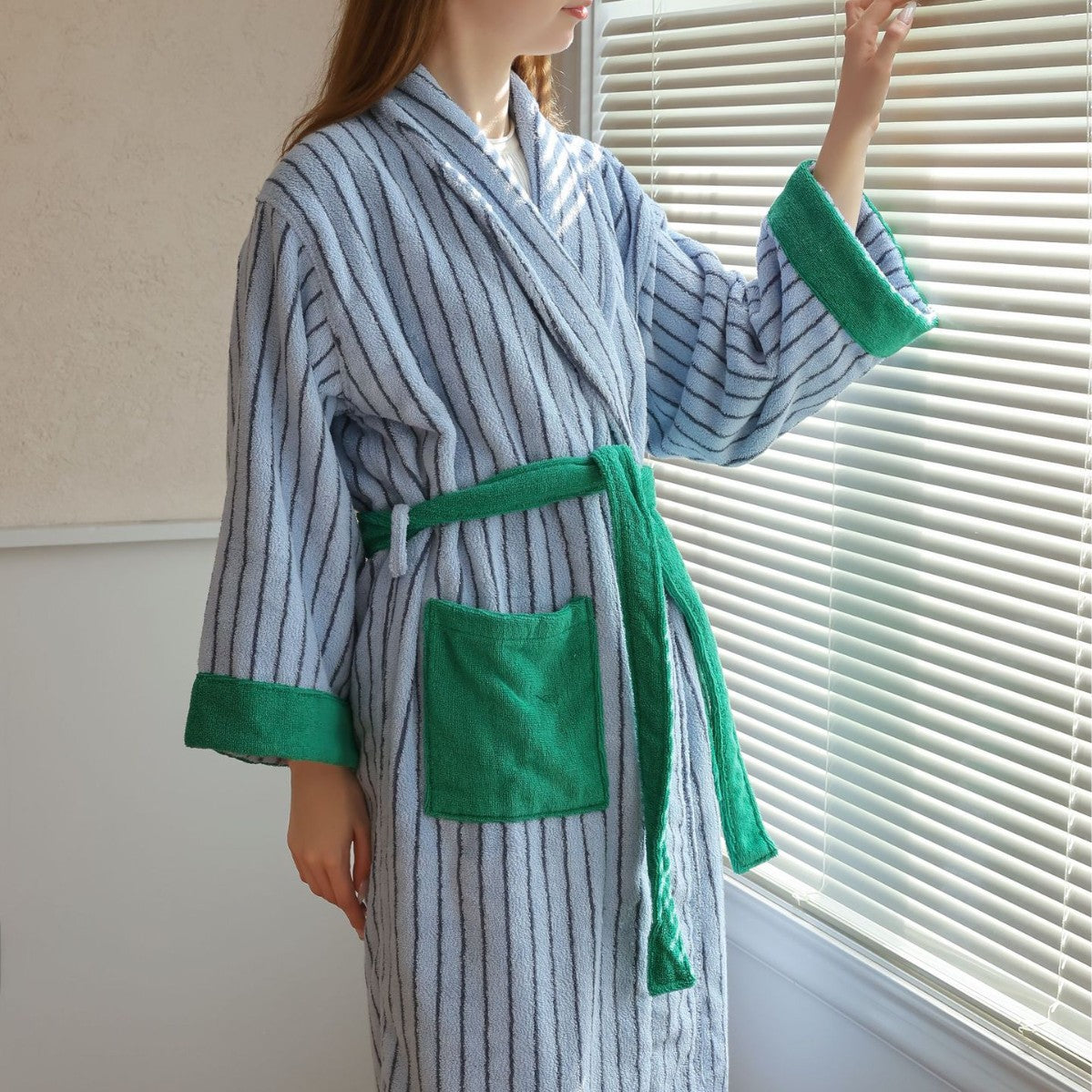 Sky blue striped cotton terry bathrobe with green trim, shawl collar and wrap tie belt
