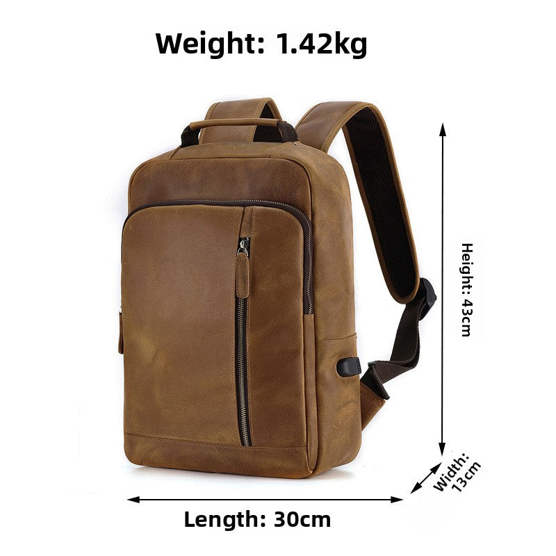 Brown cowhide backpack with a vertical front zip, 43 cm high, 30 cm long, 13 cm wide, 1.42 kg